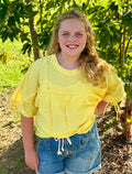 Yellow blouse with tie sleeves